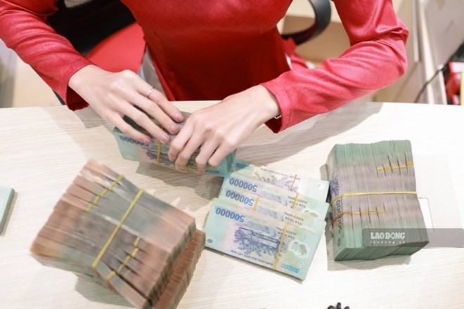 Информация, касающаяся политики заработной платы, вызывает большой интерес у чиновников, государственных служащих, служащих и работников. Фото: Хай Нгуен
