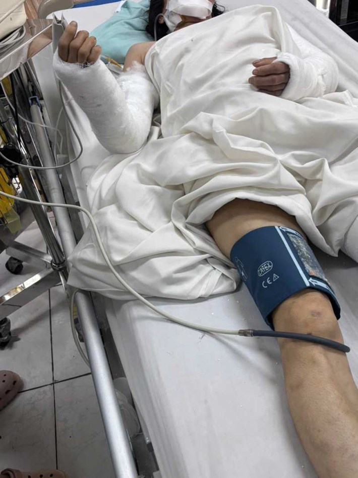 Ms. Tham broke both arms, 2 legs and jaw after a labor accident. Photo: Family provided