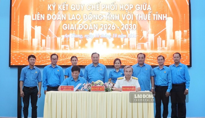 Công đoàn ký kết với Thuế tỉnh An Giang. Ảnh: Nguyên Anh
