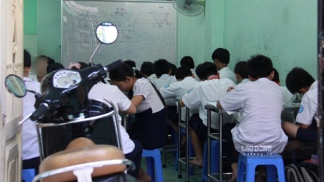 Chấn chỉnh các hiện tượng tiêu cực trong dạy thêm, học thêm và bệnh thành tích. Ảnh: Trang Hà