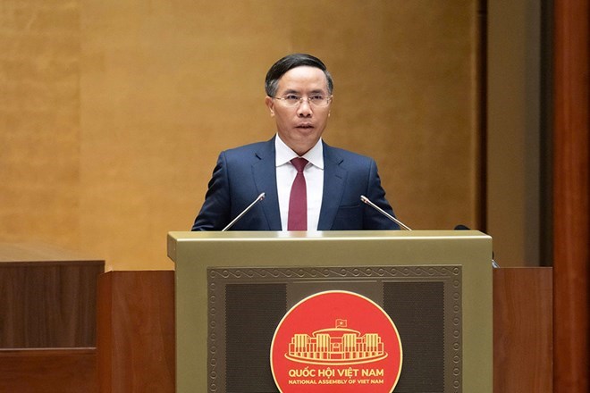 Ủy viên Trung ương Đảng, Thống đốc Ngân hàng Nhà nước Việt Nam Phạm Đức Ấn trình bày tờ trình Dự án Luật. Ảnh: Media.quochoi.vn