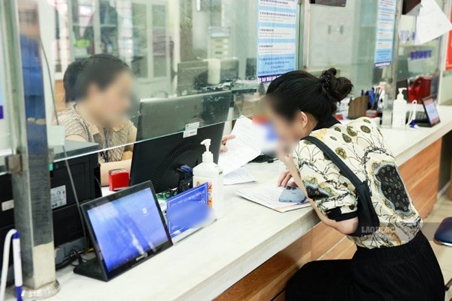 Công chức bị tạm đình chỉnh công tác nếu cố tình trì hoãn, đùn đẩy, né tránh trách nhiệm, không thực hiện công việc thuộc thẩm quyền theo chức năng, nhiệm vụ được giao. Ảnh: Hải Nguyễn
