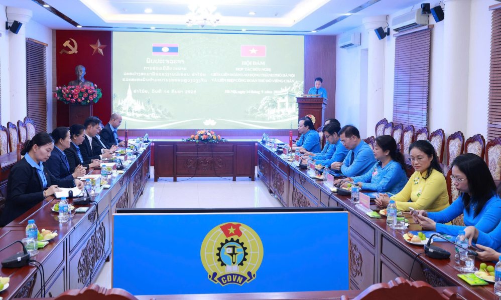 Strengthening cooperation between the Hanoi Labor Federation and the Capital Trade Union of Vientiane